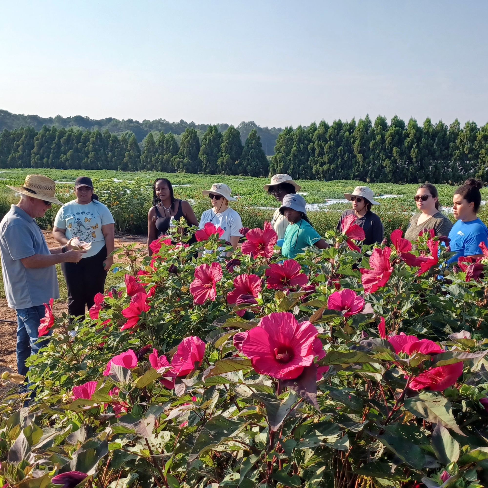 square1 Students with flowers - photo by Jason Wallace